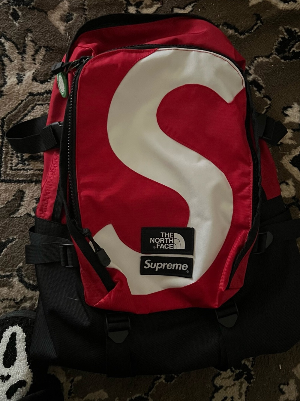 The North Face Red & White Backpack with Supreme Patch